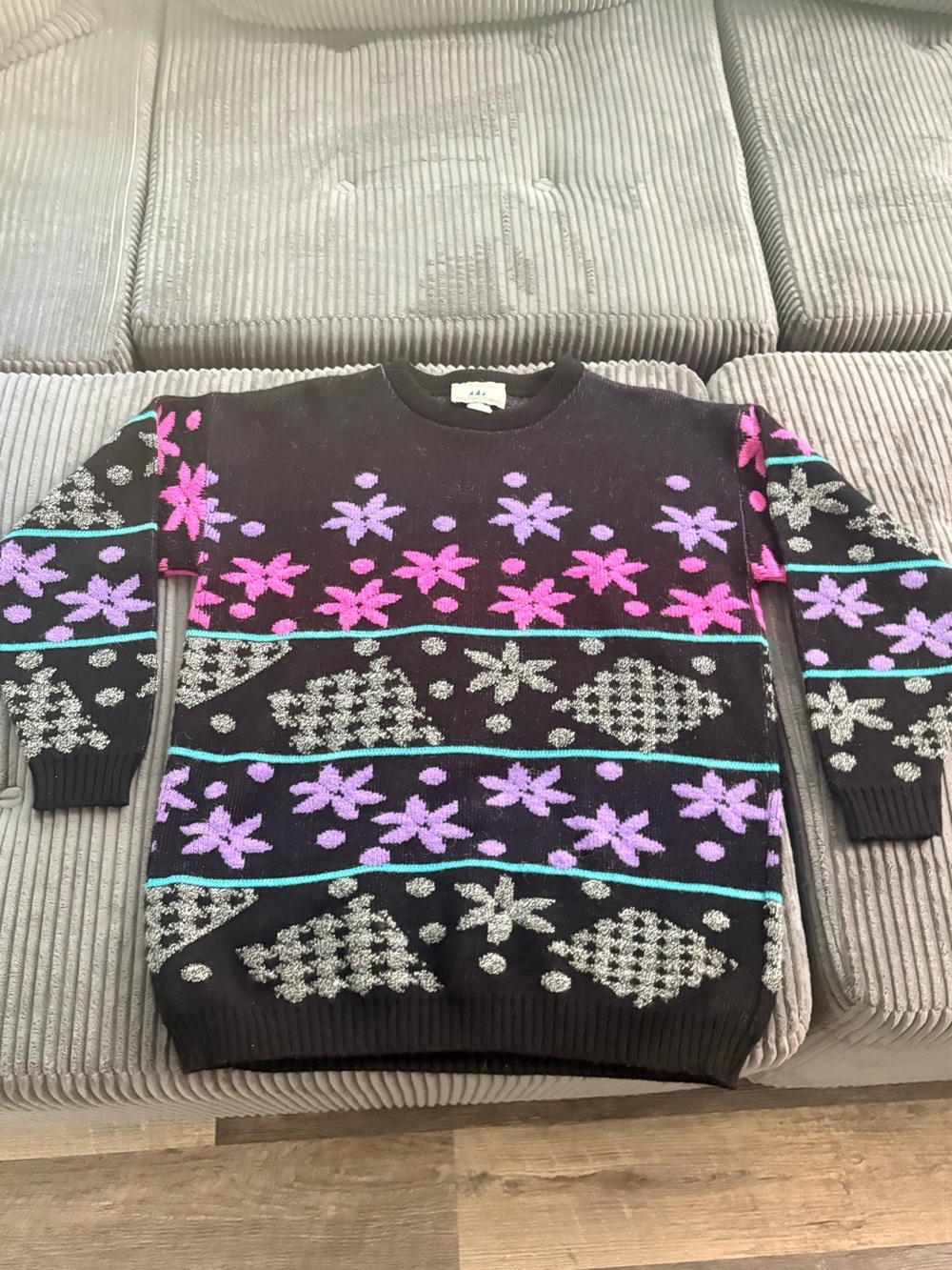 Black Crewneck Sweater with Pink & Lilac holiday Pattern - Picture 1 of 7